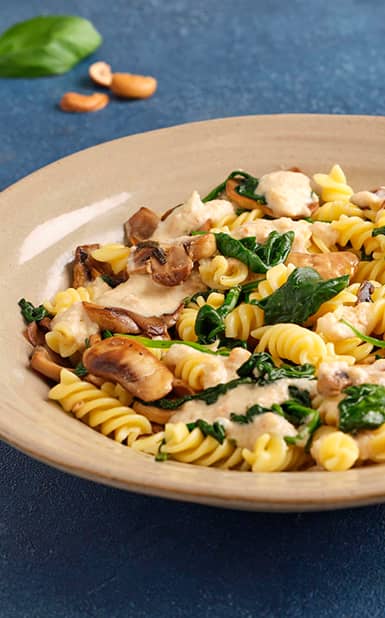 Fusilli Com Molho de Cajú, espinafres e Cogumelos