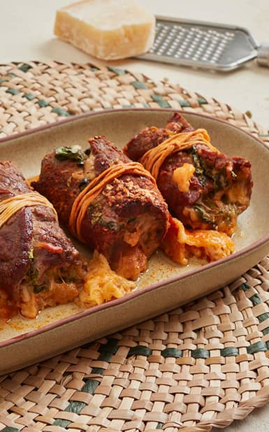 Rolinhos de Bovino com queijo e espinafres