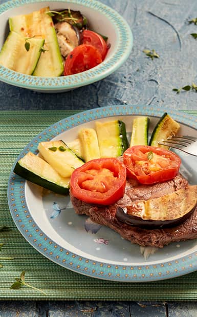 Bife de vitela com legumes grelhados