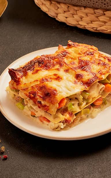 Lasanha de bacalhau com legumes