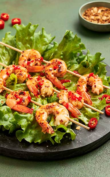 Camarão caramelizado com mel, limão e malagueta